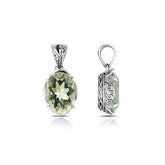 Sterling silver pendant with faceted oval green amethyst quartz, Balinese handcrafted with carved sides and oxidized detailing.